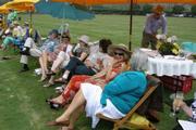 Graduates at the polo fields.