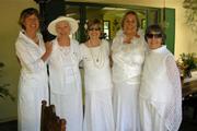 graduates at a Great Gatsby party.